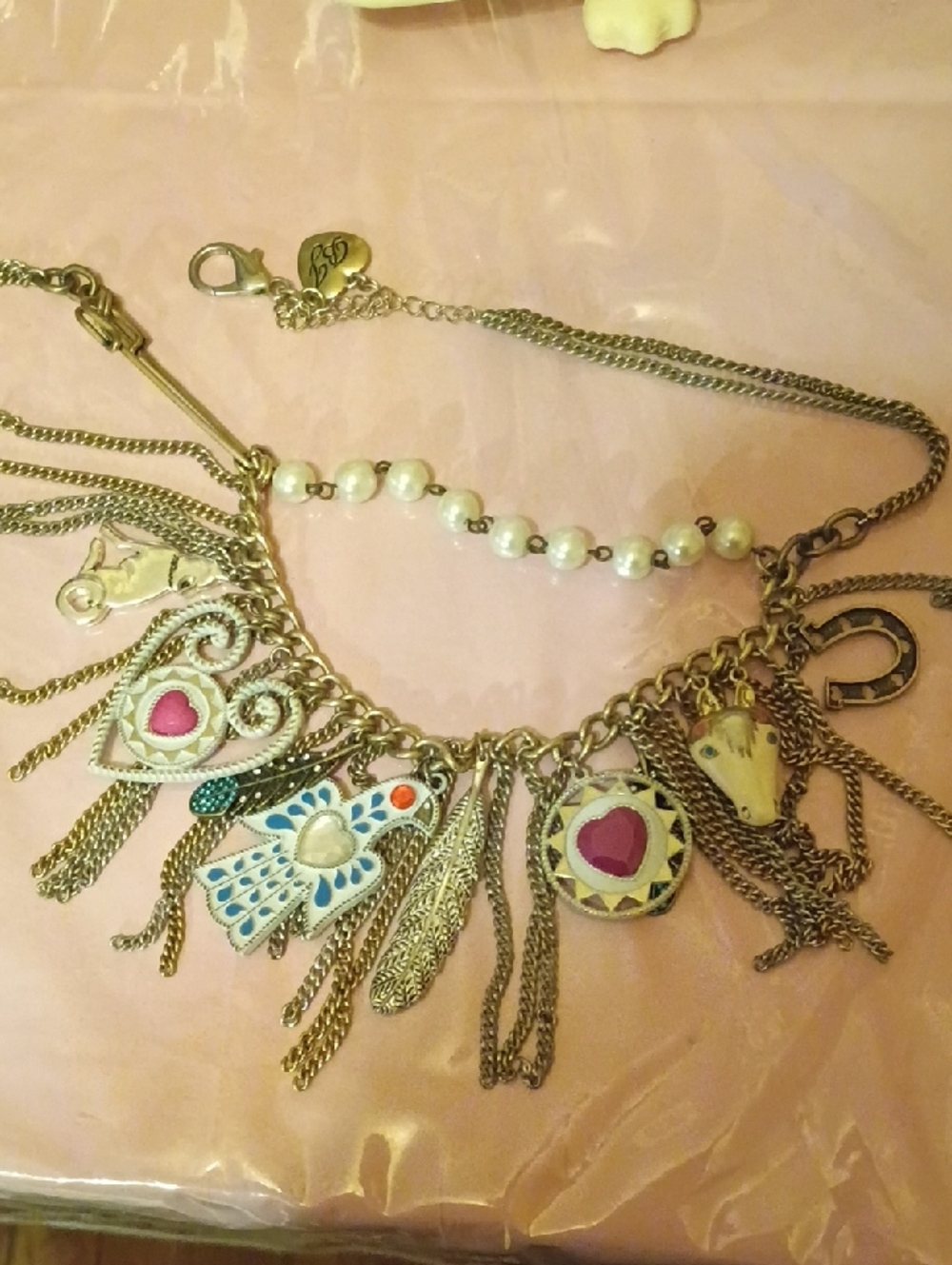 Betsey Johnson Gold Tone Multi-Charm Necklace with Pink Accents